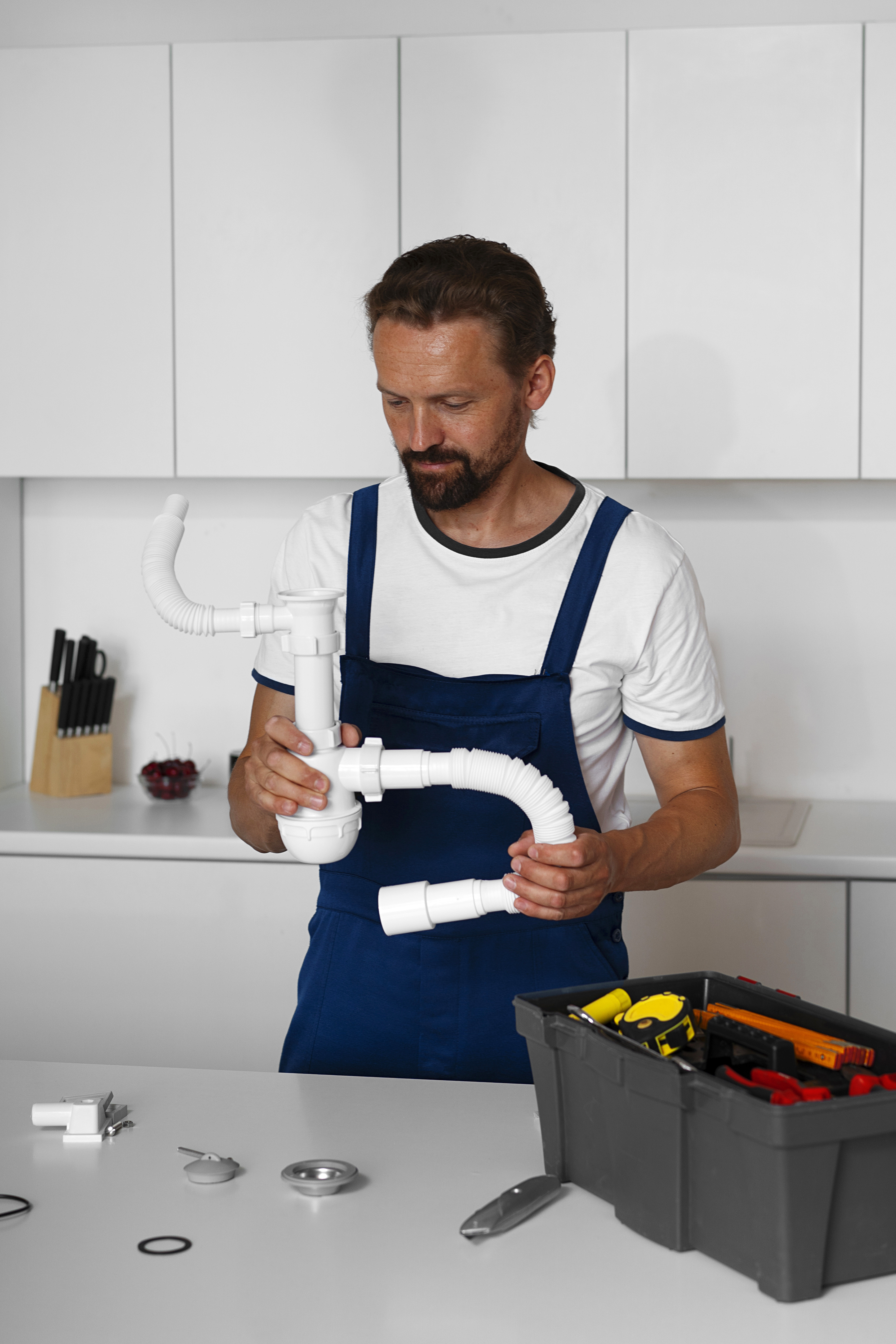 Professional plumber working in Warner Robins GA